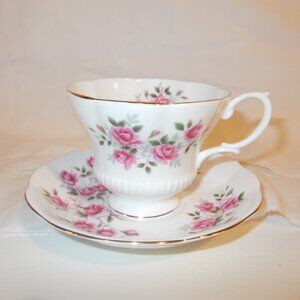 Royal Albert bone china teacup and saucer with pink roses